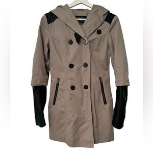 Stunning trenchcoat with edgy accents